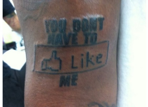 T-Pain's awful Facebook inspired tattoo.